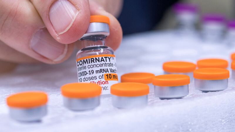 FILE - An ampoule of the vaccine "Comirnaty" for children from the manufacturer...