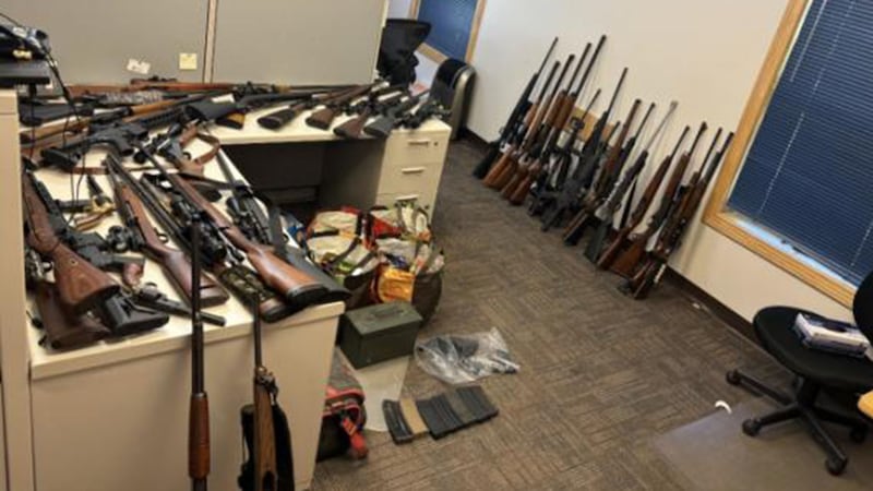 Police say they seized more than 40 guns when they executed a search warrant at a home in...